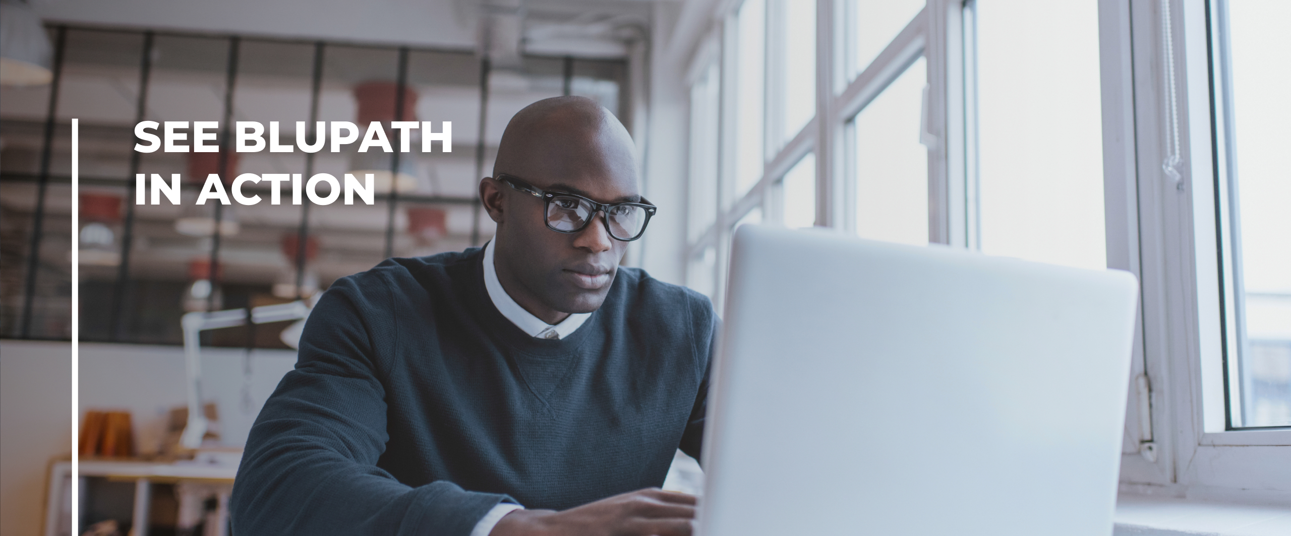 Financial Officer using Blupath platform on laptop.